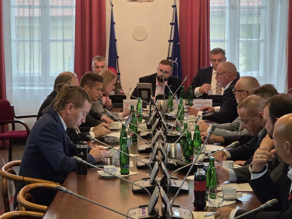 poslanci politik voják
