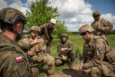 U.S. Soldiers from 1st Cavalry Division and Polish forces trained together at Bemowo Piskie, Poland, building skills in mine ID, explosives, and live detonation.